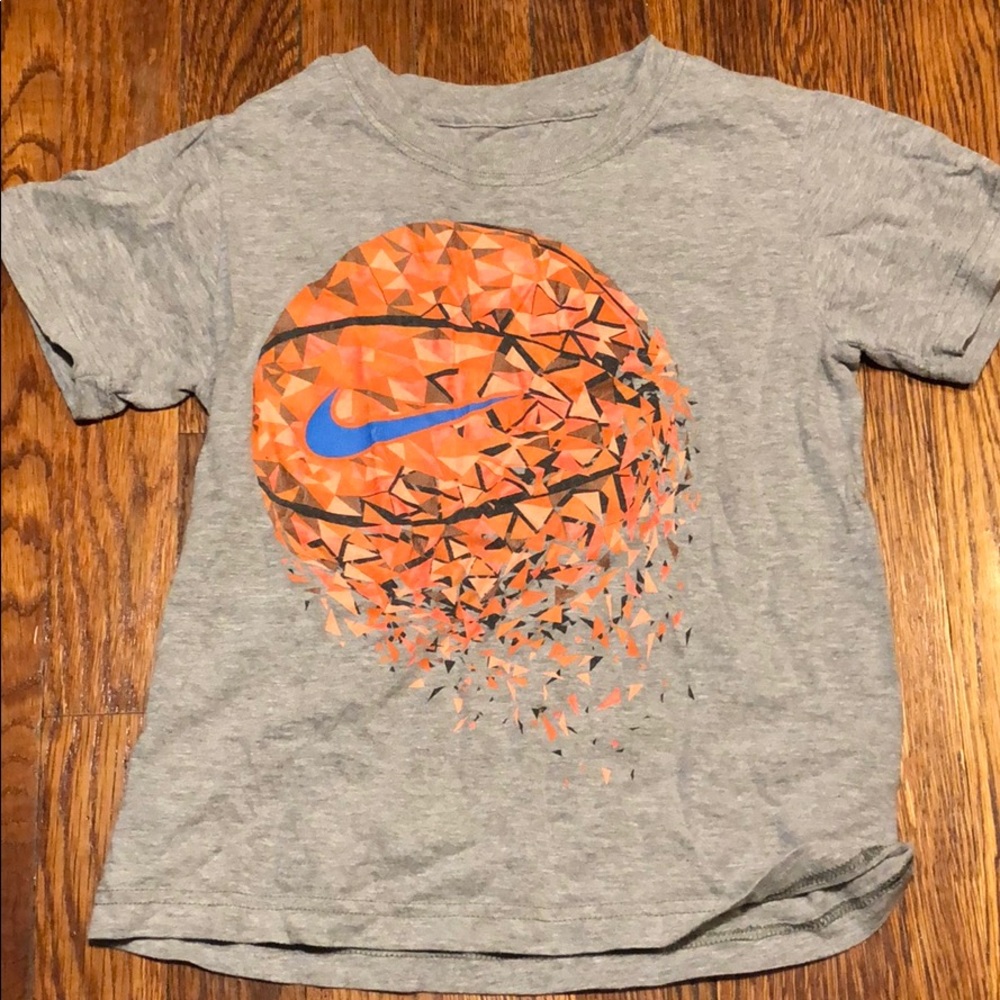 Nike basketball t-shirt size 5. Gently used